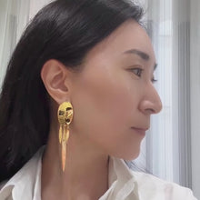 Load and play video in Gallery viewer, Long dangling gold earrings
